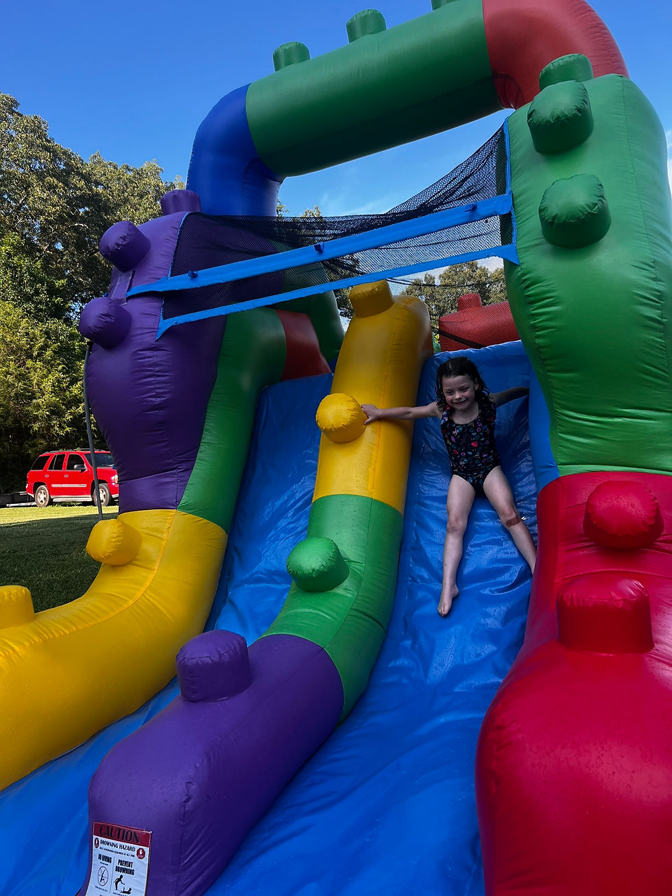 42-foot inflatable obstacle course water slide rental from Jungle Rentals